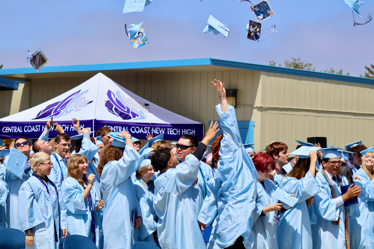 Central Coast New Tech High School’s graduates toss their caps in the air during commencement on June 6, 2026.