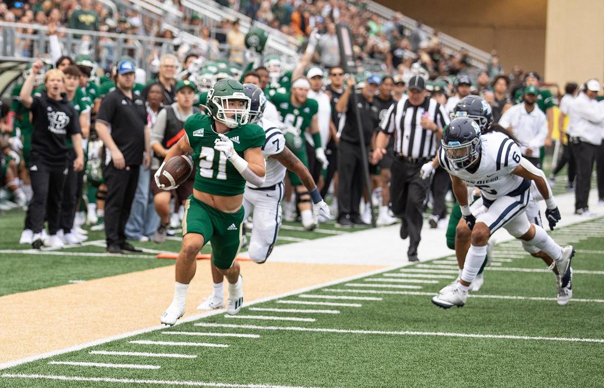 Mustang running back Troy Fletcher en route to a touchdown. Cal Poly SLO football beats University of San Diego 27-10 in season opener at Cal Poly University’s Mustang Memorial Field in San Luis Obispo, Saturday, September 2, 2023.