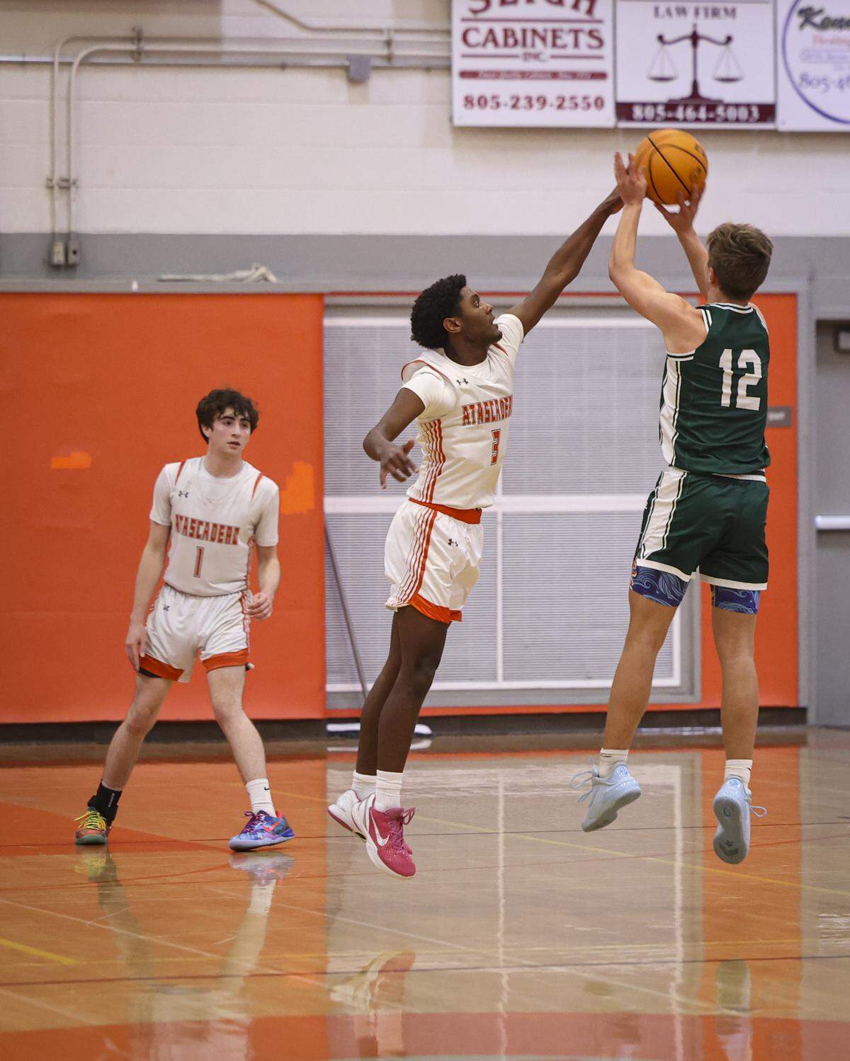 Shea Buckley defends against a shot by Kevin Sass. Atascadero beat Templeton High School 76-55 in a basketball game on Jan. 20, 2026.