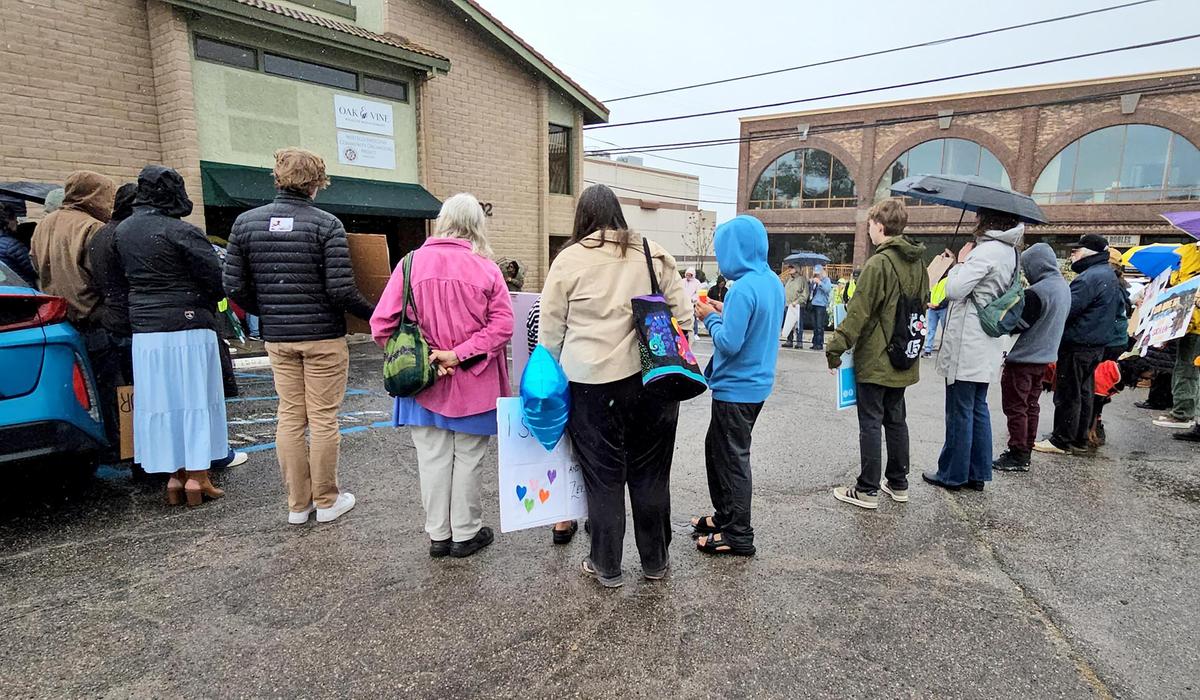 Protesters gathered the in Mixteco Indígena Community Organizing Project office parking lot. It and other immigrant advocacy organizations led a march in Paso Robles to protest deportation and President Donald Trump’s immigration policies on Sunday, March 30, 2025.
