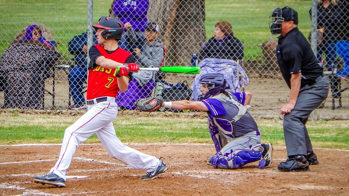 Senior pitcher and infielder Chase Volz bats against Washington Union on Friday, March 9.  Volz is a pivotal part of Coast Union's chances for success in 2018.