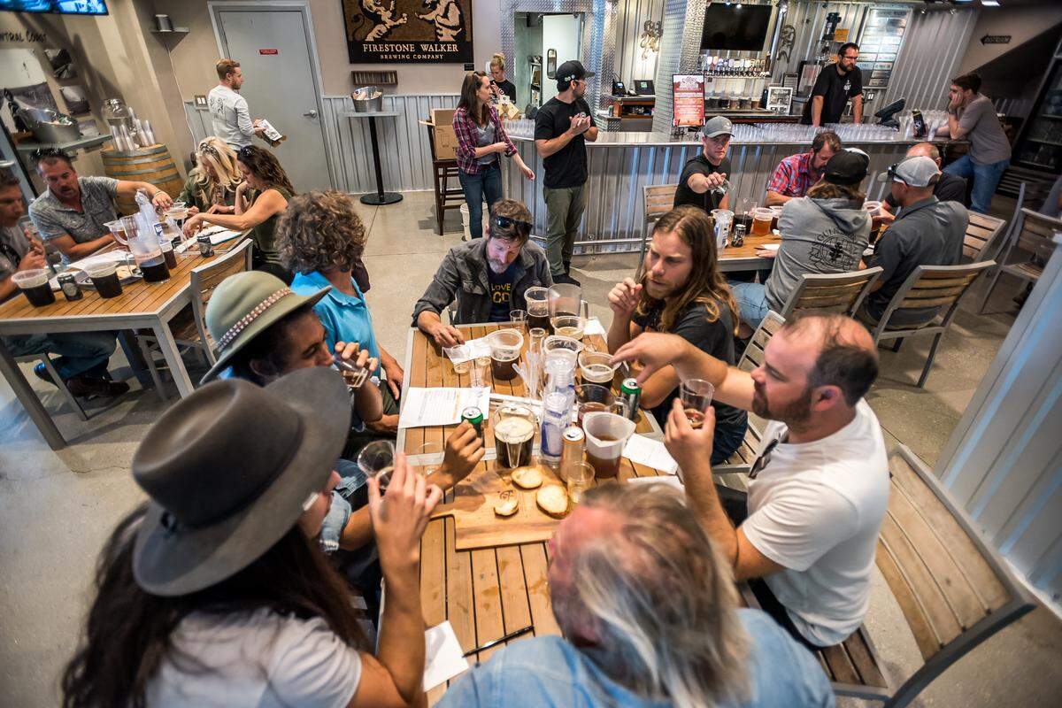 Participants take part in an Anniversary Ale blending competition at Firestone Walker Brewing Co. in Paso Robles.
