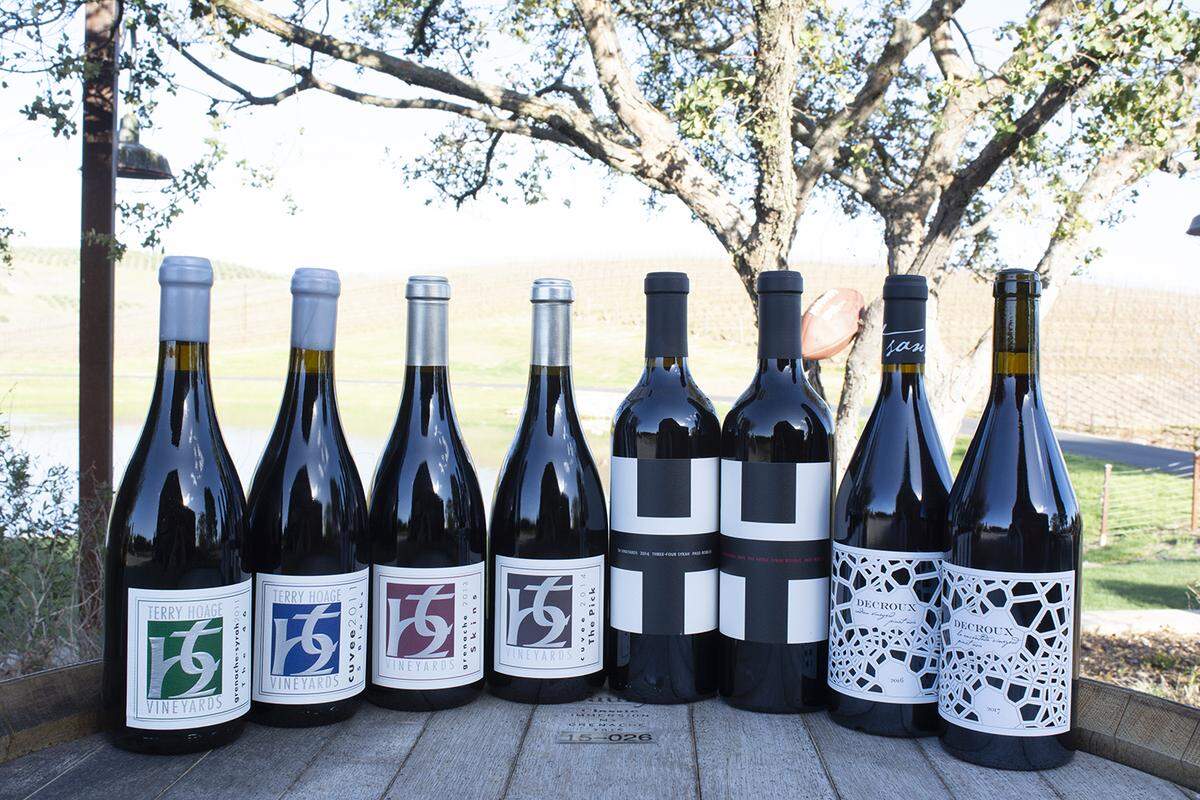A collection of TH Estate Wines, featured outside.