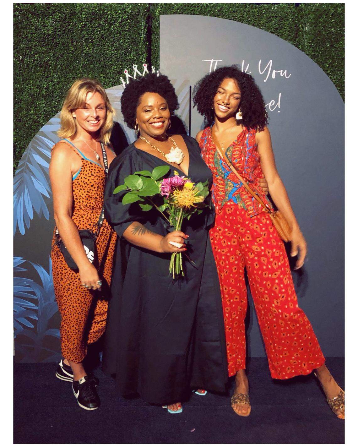 Tianna Arata, right, and her mom, Michelle Arata, left, pose with Patrisse Cullors, center. Cullors is the founder of the Black Lives Matter Global Network.