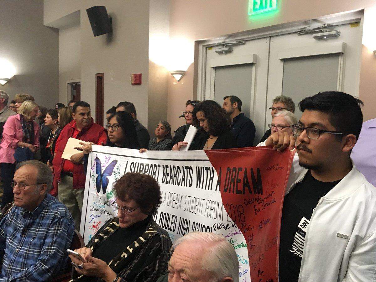 Paso Robles High School students hold a banner that reads "I support Bearcats with a dream." The students joined other residents at a City Council meeting on Tuesday, May 1, 2018, where officials discussed California's "sanctuary state" law.