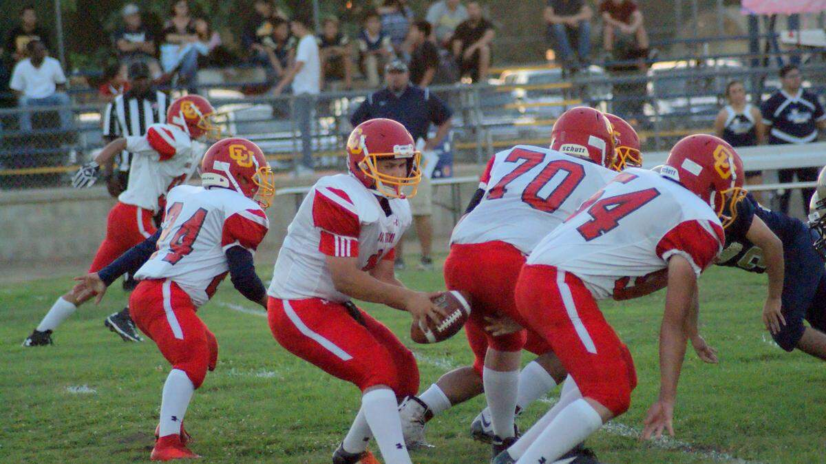 Coast Union High School junior quarterback Emany Plasencia ran for four touchdowns and threw for another in the Broncos loss Friday to Laguna Blanca in Santa Barbara.