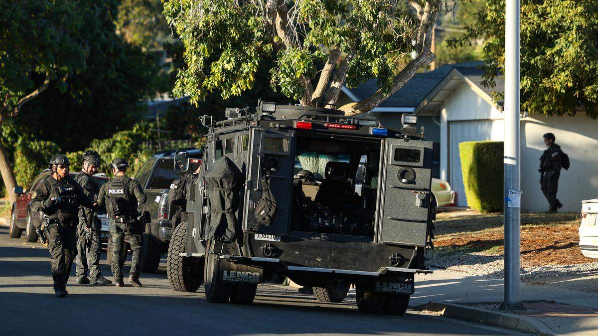 San Luis Obispo County Regional SWAT team members wrap up after helping the San Luis Obispo Police Department serve a warrant at 1235 West Newport St. in San Luis Obispo on Sunday, Oct. 29, 2023. Residents were asked to shelter in place while suspects were taken into custody.