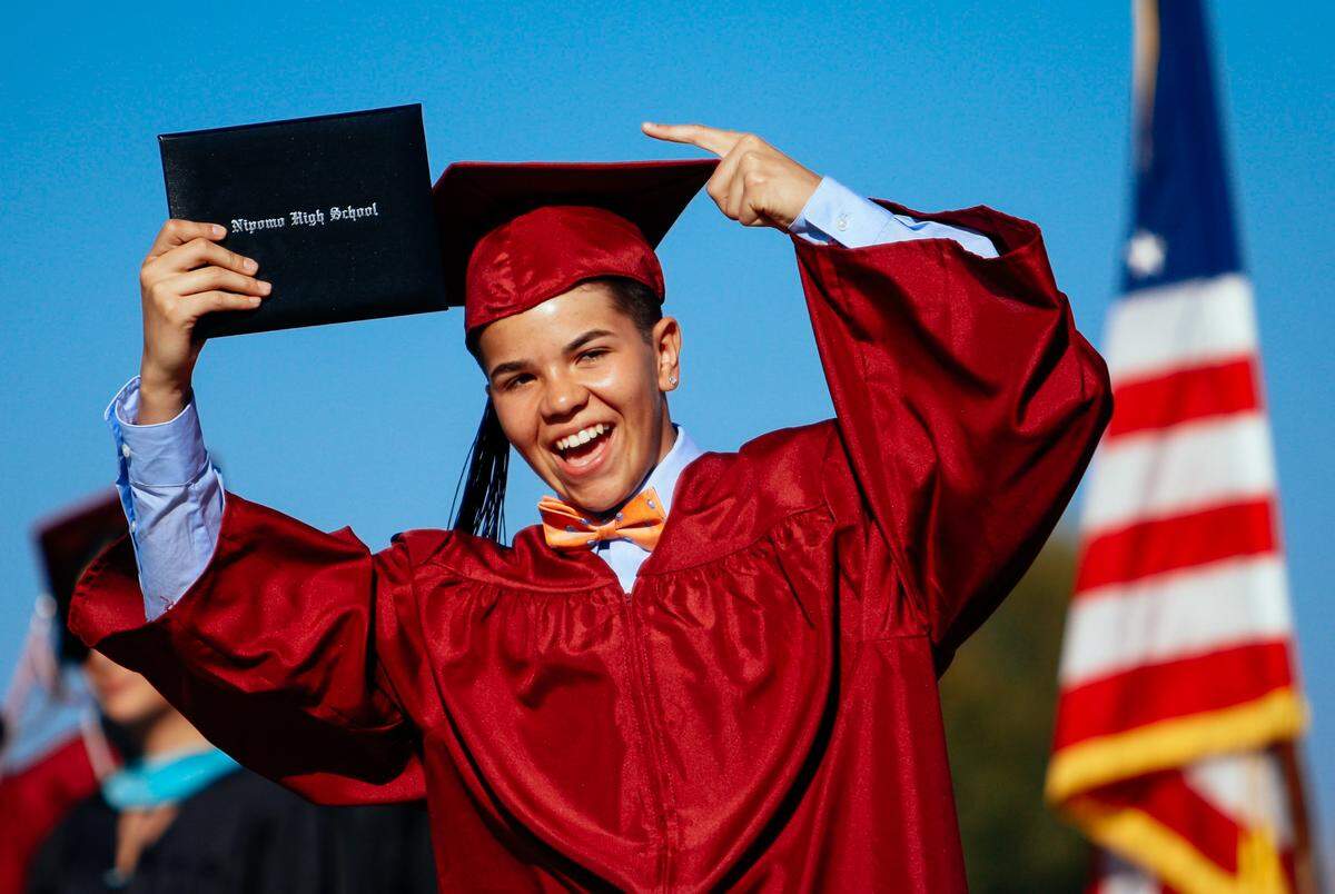 Alexa Pendergrass celebrates as her name is called during the Nipomo High School graduation ceremony in June 2018. Photo by Joe Johnston 06-08-18