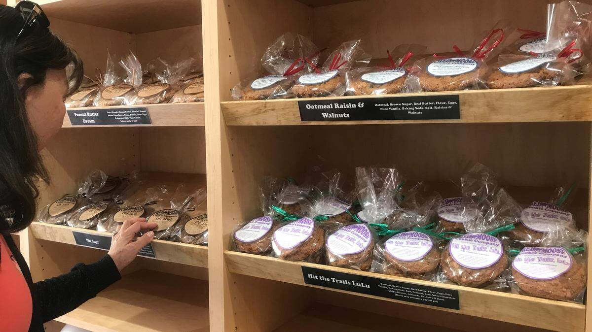 A customer checks out the offerings at Red Moose Cookie Company in Cambria.