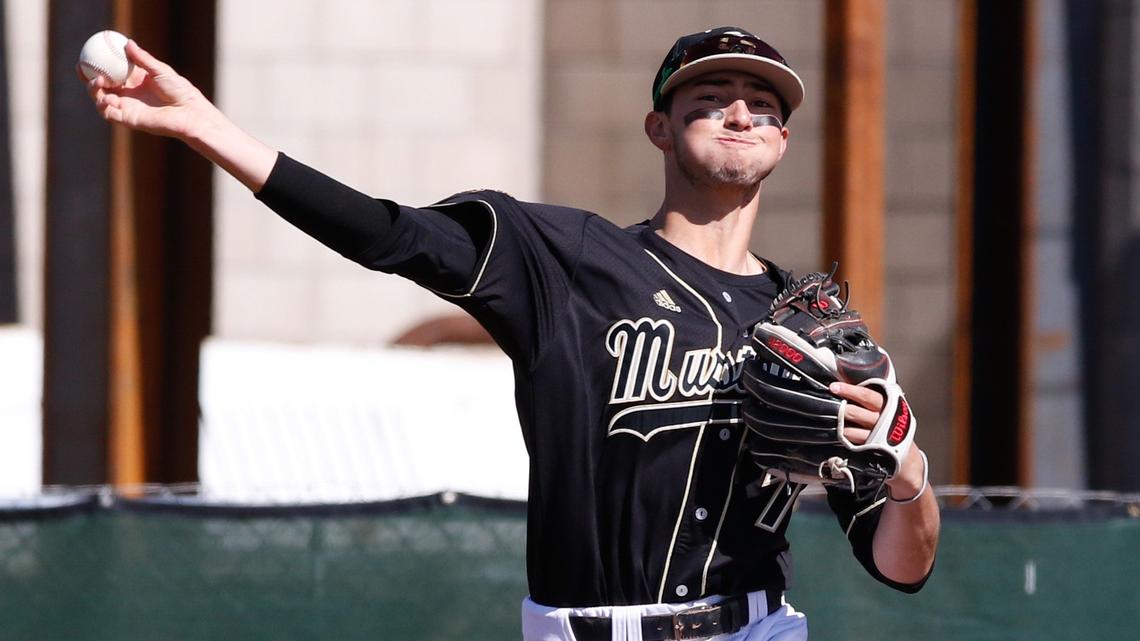 Cal Poly’s Nick DiCarlo throws from third for the out Sunday in the final game of a non-conference series against Cal.