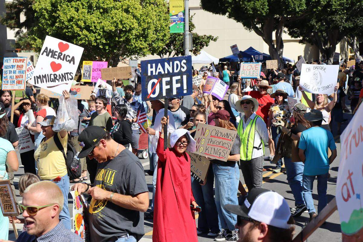 Thousands of people attended the No Kings rally in downtown San Luis Obispo to protest the Trump administration and support Prop. 50 on Oct. 18, 2025.
