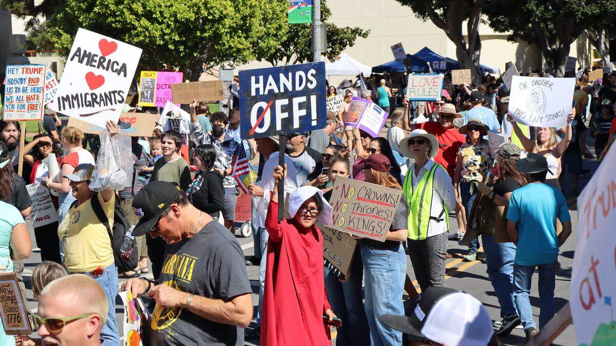 Thousands of people attended the No Kings rally in downtown San Luis Obispo to protest the Trump administration and support Prop. 50 on Oct. 18, 2025.