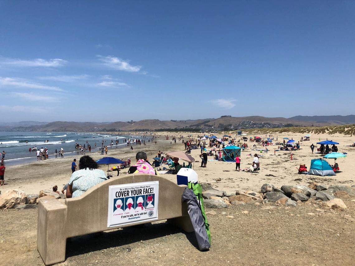 Crowds flocked to Morro Rock Beach in San Luis Obispo County, California, on Sunday, Aug. 16 as a statewide heatwave hit.