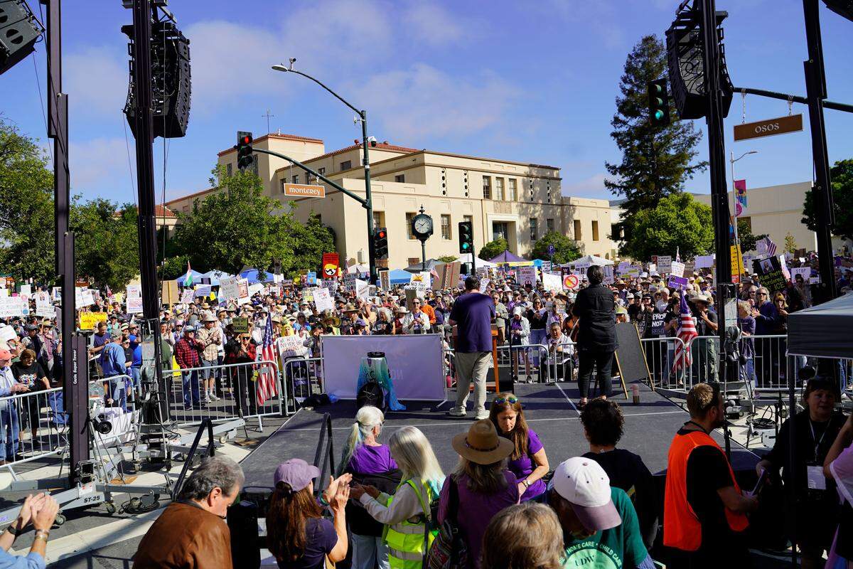 Residents across SLO County rallied downtown at the San Luis Obispo Superior Courthouse for a No Kings protest featuring speakers, music and community groups on March 28, 2026.