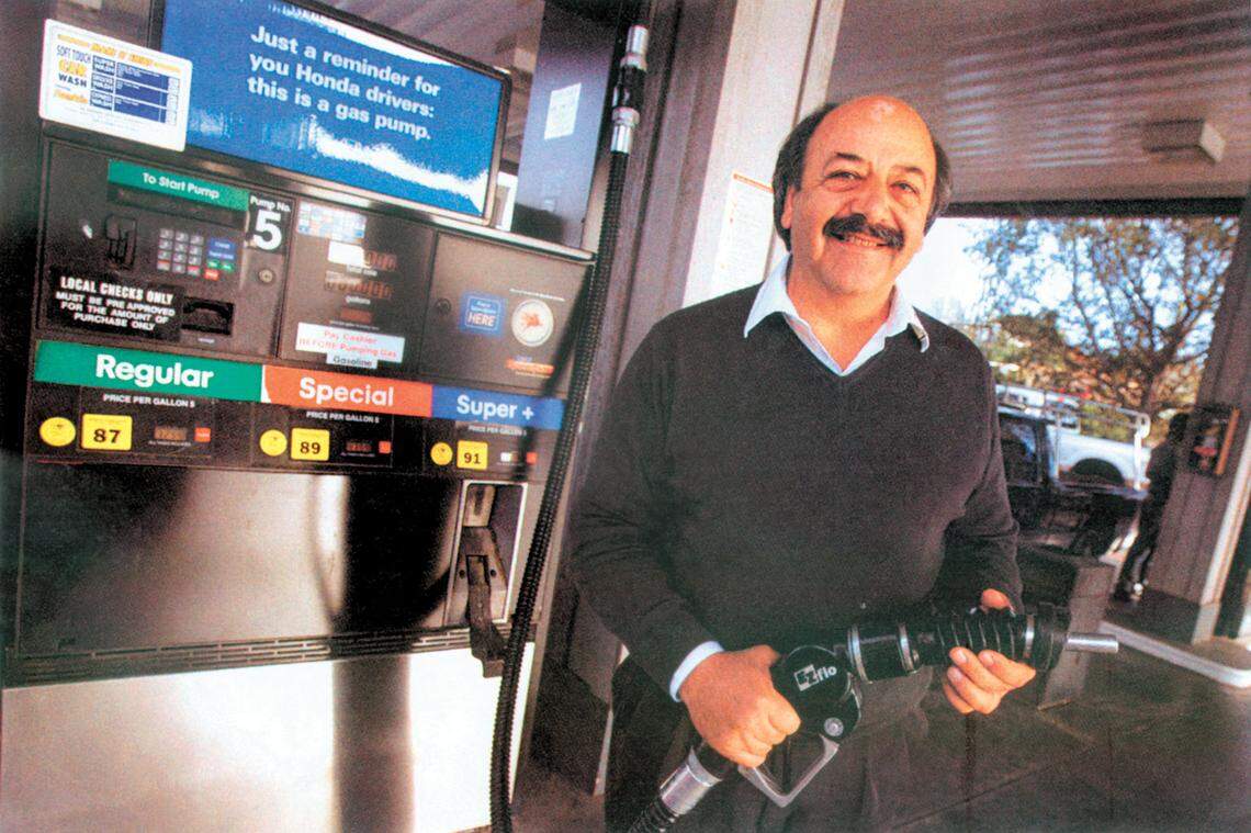 County Supervisor Katcho Achadjian poses at one of the three gas stations he owns in Arroyo Grande.