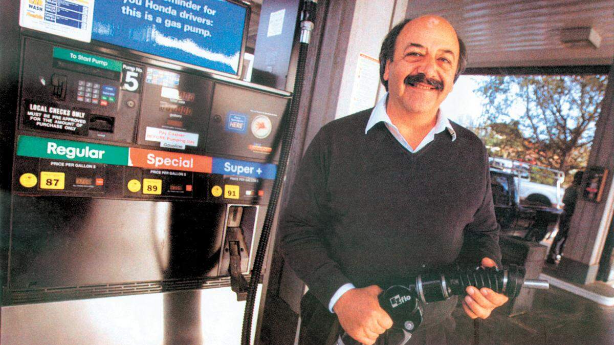 County Supervisor Katcho Achadjian poses in an undated photo at one of the three gas stations he owns in Arroyo Grande.