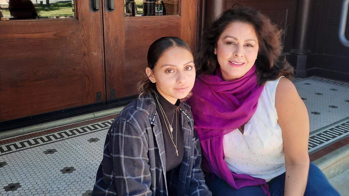 Madrinas para Latinas founder Veronica Macias and Angela Martinez, an 11th grade student at Paso Robles High School, sit outside of the Paso Robles History Museum. Martinez plans to become an obstetric travel nurse.