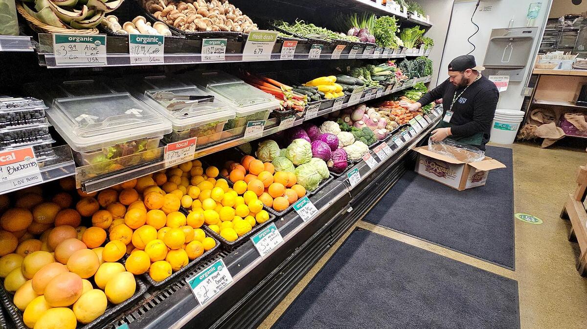 Produce manager, Josh Perez, brother of Joslyn Perez, tends the produce at the SLO Food Co-op.