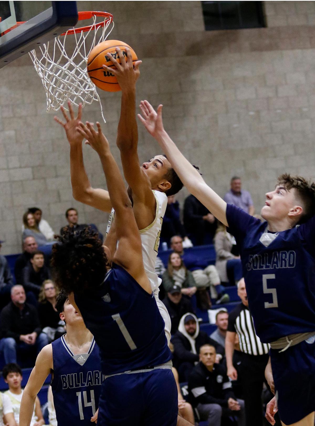 Mission Prep’s Jamar Howard (23) goes for a basket. The Mission Prep boys basketball team beat Bullard High School 66-50 in a first-round playoff game in San Luis Obispo, Feb. 15, 2023.