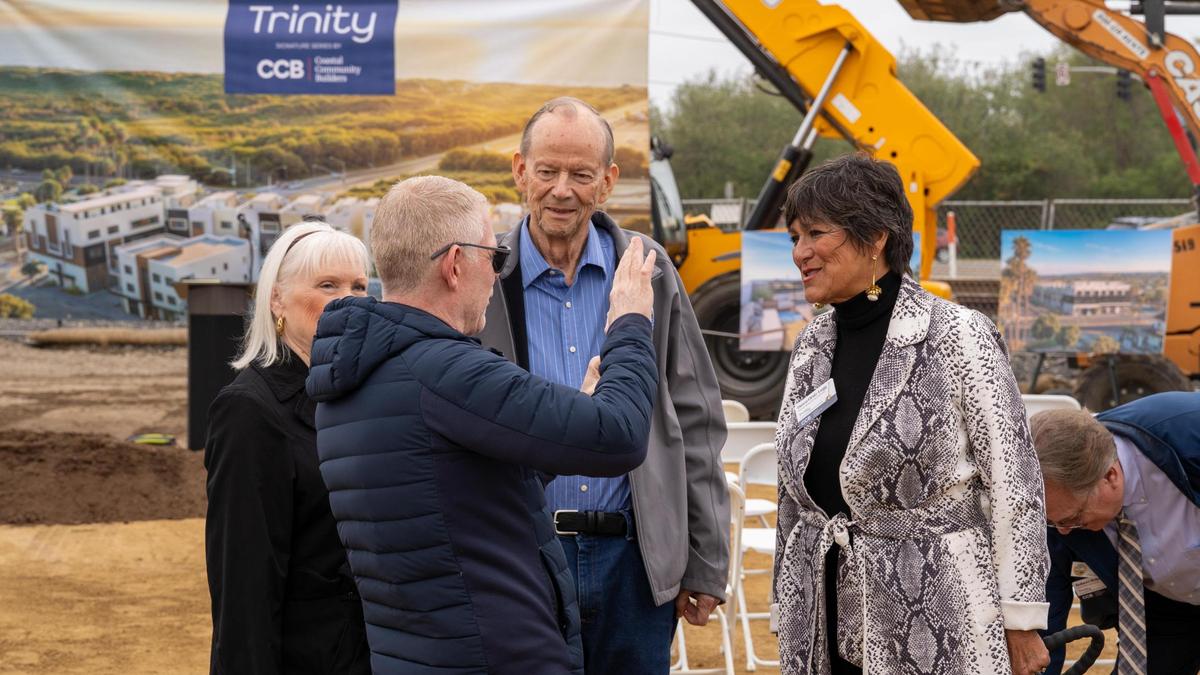 Coastal Community Builders founder Gary Grossman speaks to Pismo Beach Mayor Ed Waage and San Luis Obispo District 3 Supervisor Dawn Ortiz-Legg during the official groundbreaking of Trinity, a 23-unit mixed-use condo development at 197 W Grand Ave., pictured here Wednesday, March 26, 2025.