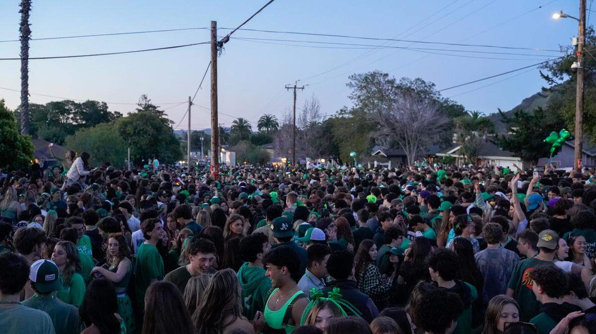 Cal Poly students turned out early Saturday morning, March 16, 2024, for St. Fratty’s Day on Hathway Avenue near the university.