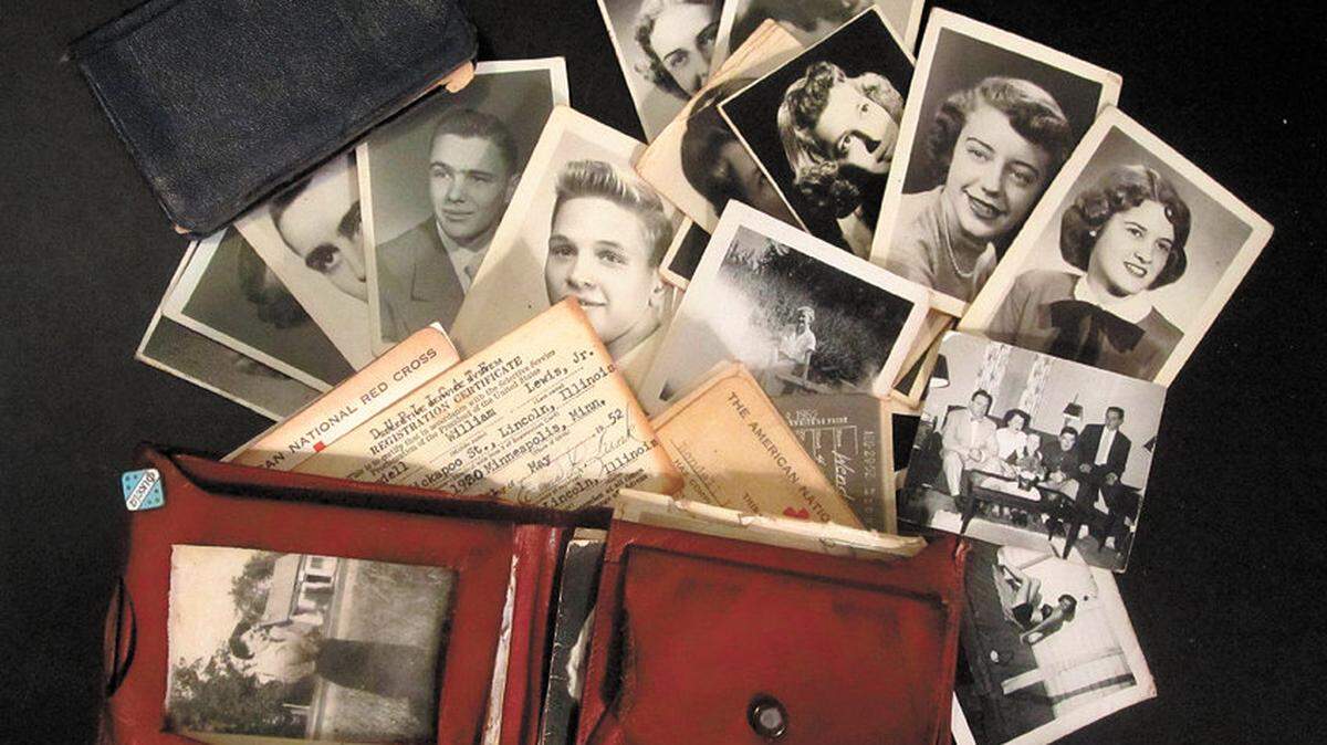 The wallet found at Camp Roberts held an Army ID card from 1953 and many family photos.