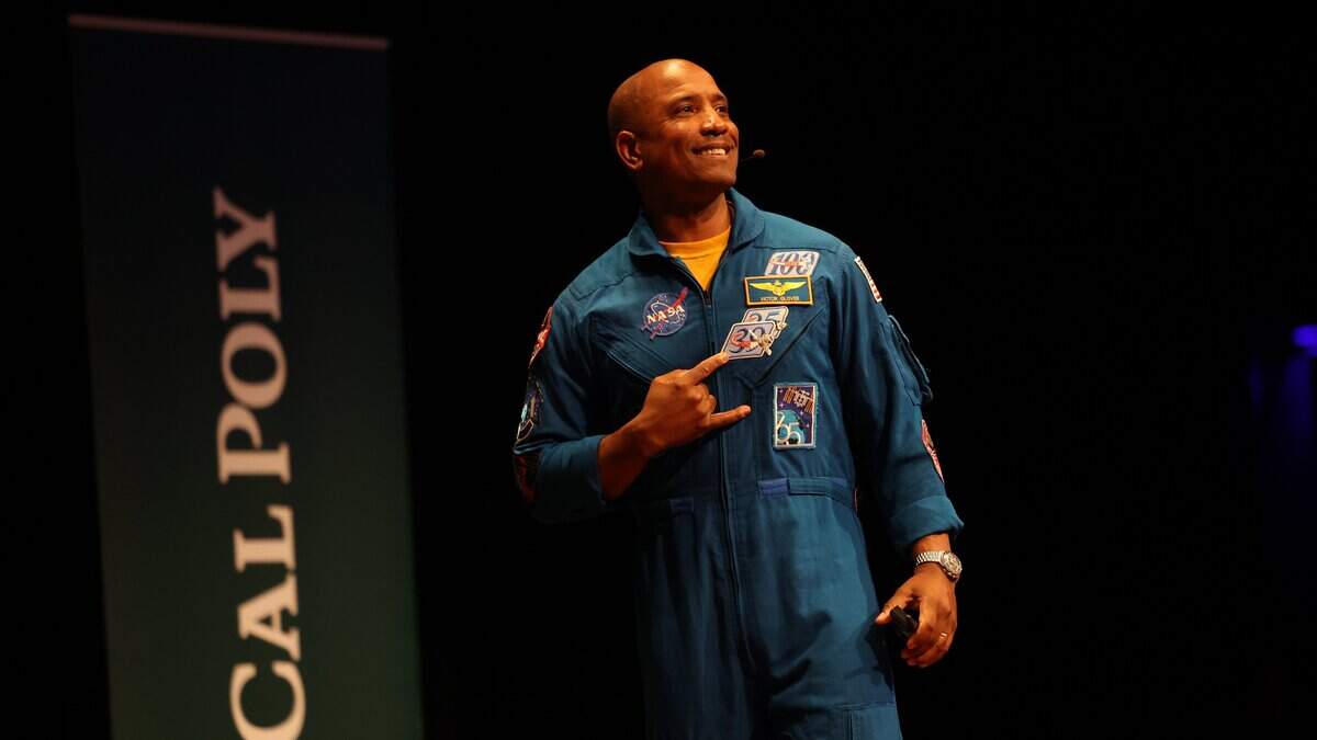 NASA astronaut Victor J. Glover was pilot of NASA's Artemis II mission to the moon in April 2026. The Cal Poly graduate spoke at the PAC on June 16, 2026. Here he signals to his fraternity Phi Beta Sigma.