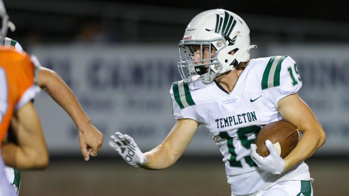 Daxton Calagna runs with the ball in the Templeton Eagles’ 27-21 loss to the Atascadero Greyhounds in an Ocean League football game on Oct. 7, 2022.