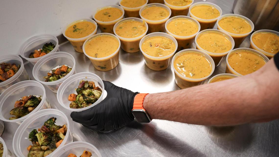 Cayden’s Curry Co. owners are Grady and Brittney Pope working at a commercial kitchen seen here on March 24, 2025.