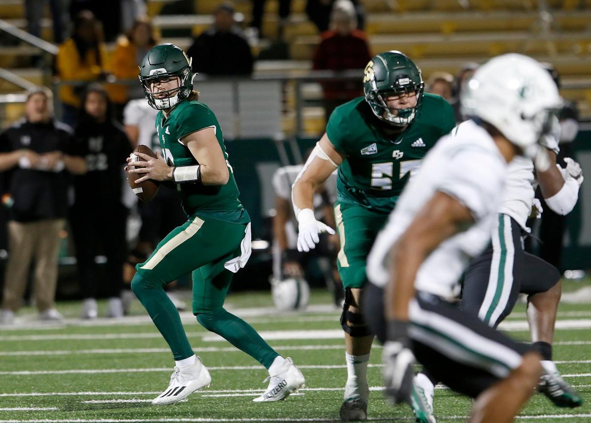 Mustang quarterback Spencer Brasch looks for a receiver. Cal Poly beat Portland State 49-42 to earn their first and only Big Sky win of the season on Saturday, Nov. 19, 2022, at Alex G Spanos Stadium in San Luis Obispo.