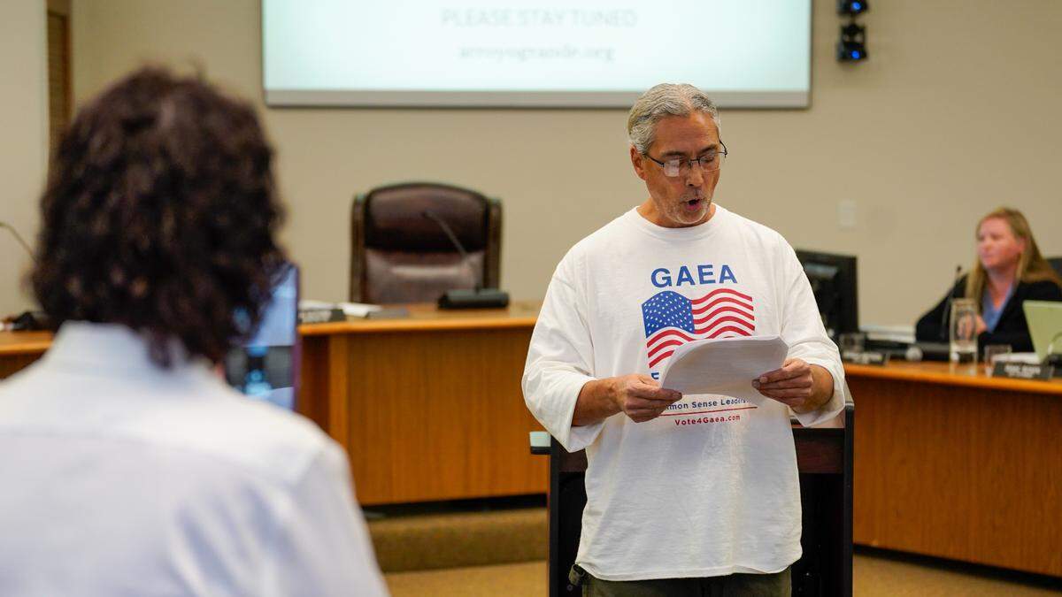 Arroyo Grande mayoral candidate Gaea Powell records a speech by one of her supporters at the City Council meeting Aug. 27, 2024. Multiple commenters said they were frustrated with the City Council’s decision to limit general public comment from three minutes to one minute.