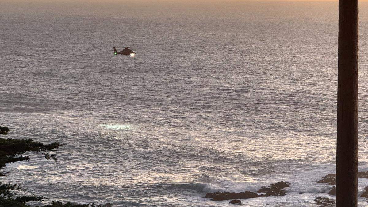 Officials search for a man swept into the ocean at Soberanes Point in Garrapata State Park on Saturday, Nov. 23, 2025.