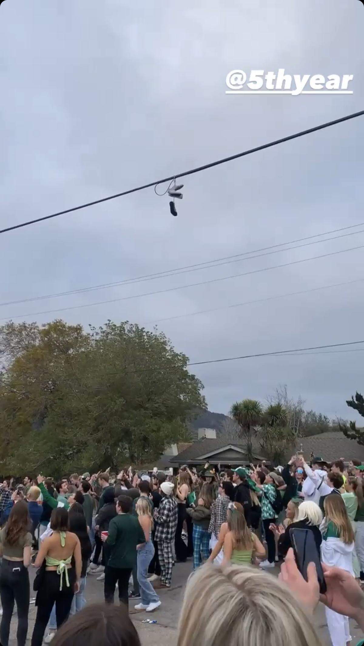 A crowd of people gather in the streets of San Luis Obispo, Calif., on Saturday at 6:43 a.m., as part of St. Fratty's Day celebration March 13, 2021, according to a Cal Poly Bartstool Instagram story.