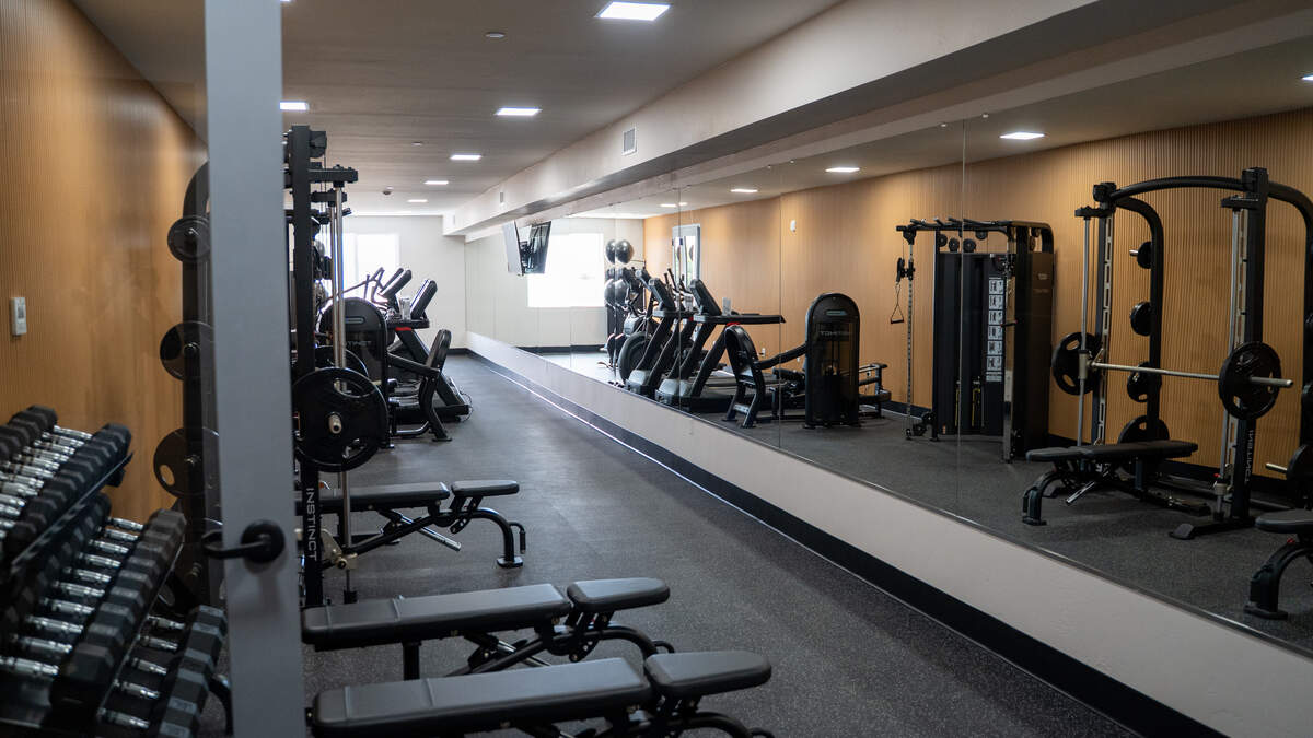 The residents-only gym was on display during the grand opening of the 59-unit “Encore” project on West Grand Avenue on Saturday, June 13, 2026. Visitors were invited to tour the lobby, rooftop, units and amenities of both buildings.