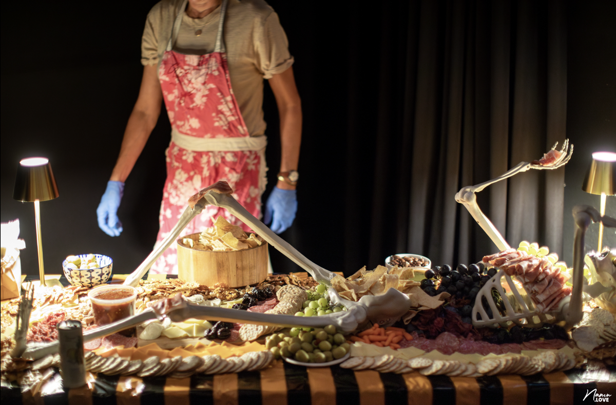 Last year’s annual Haunting party had a skeleton charcuterie with cheeses, fruit and meats.