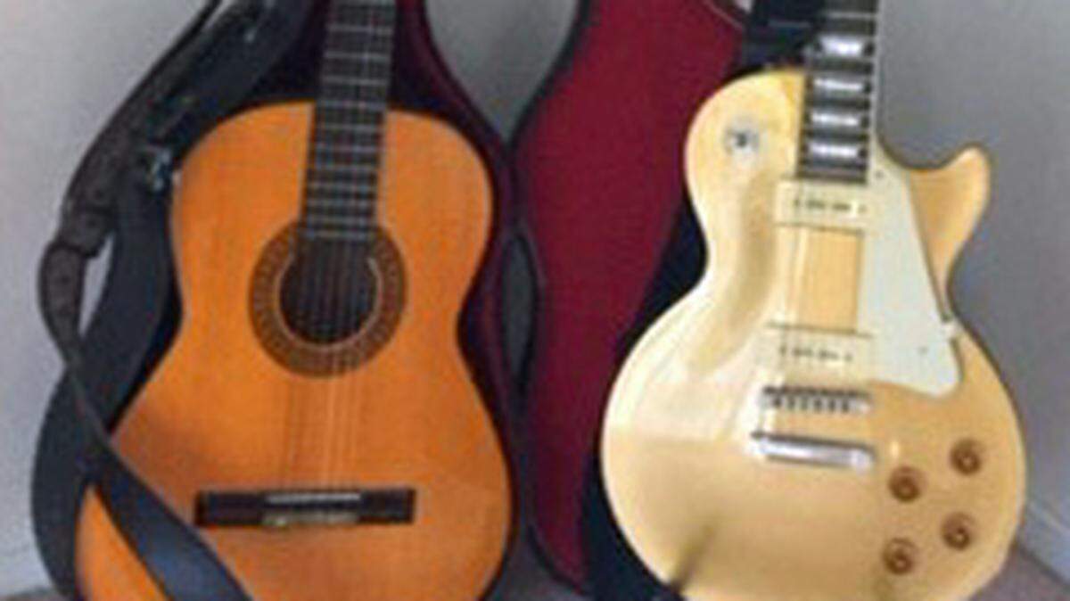 Sherrie Rheingans of San Luis Obispo gifted two guitars that formerly belonged to her son, who died suddenly over two years ago, to Dan Tower of Cambria, who lost his instruments in a house fire.
