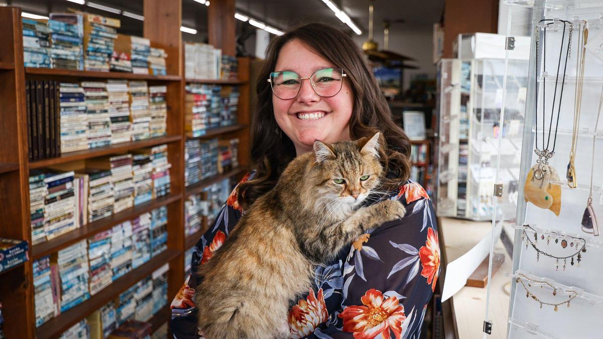 Nan’s in Grover Beach is expanding its offerings to include crystals under the ownership Kassi Dee, granddaughter of founder Nan Fowler. She’s seen here with Scout Finch, one of the store cats.
