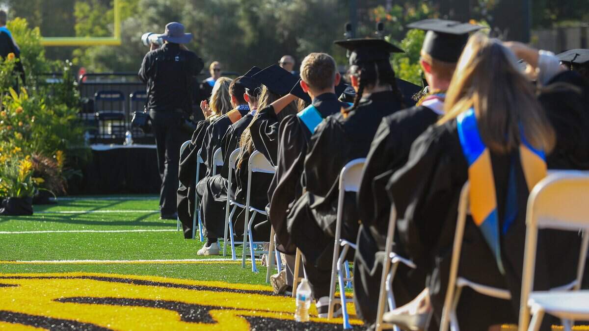 San Luis Obispo High School seniors sit in the sun during commencement ceremonies at Holt Field on Friday, June 5, 2026. 374 seniors received their diplomas.