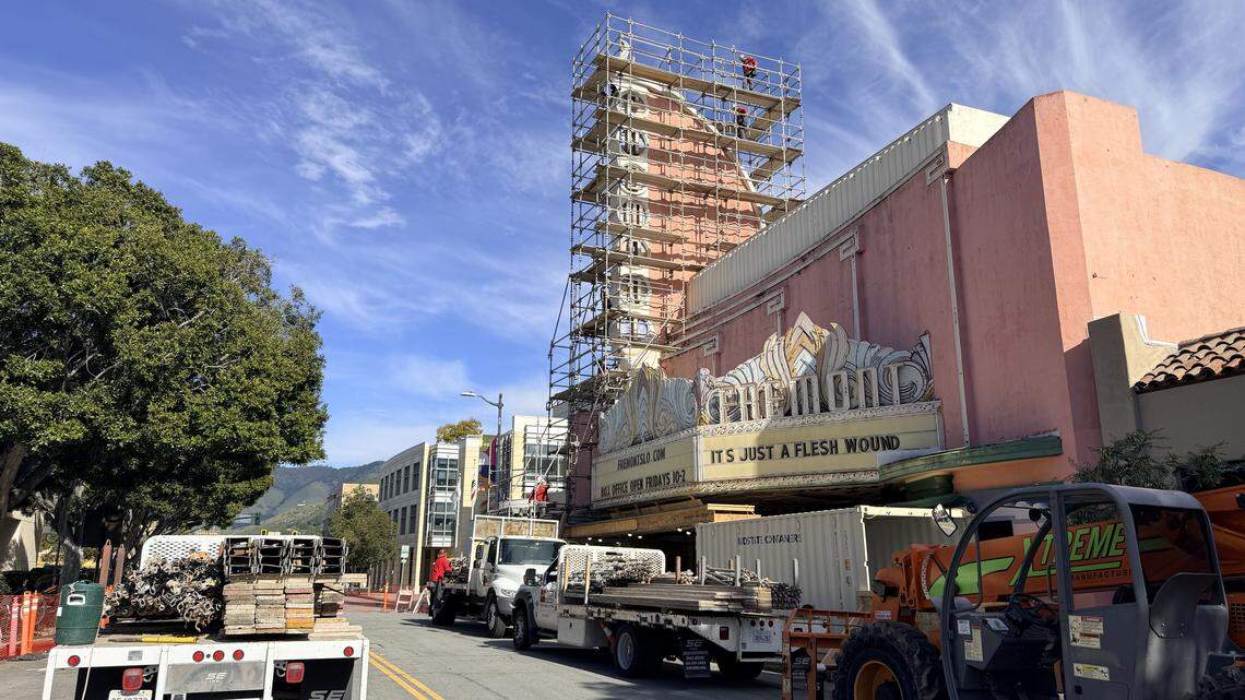 Workers set up scaffolding around the damaged Fremont Theater sign on Wednesday Feb. 25, 2026, in downtown San Luis Obispo.