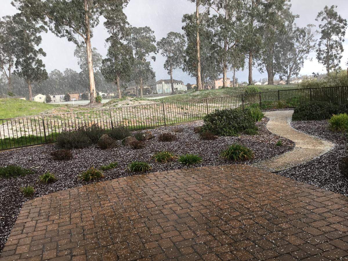 Hail on the ground at Trilogy at Monarch Dunes in Nipomo.