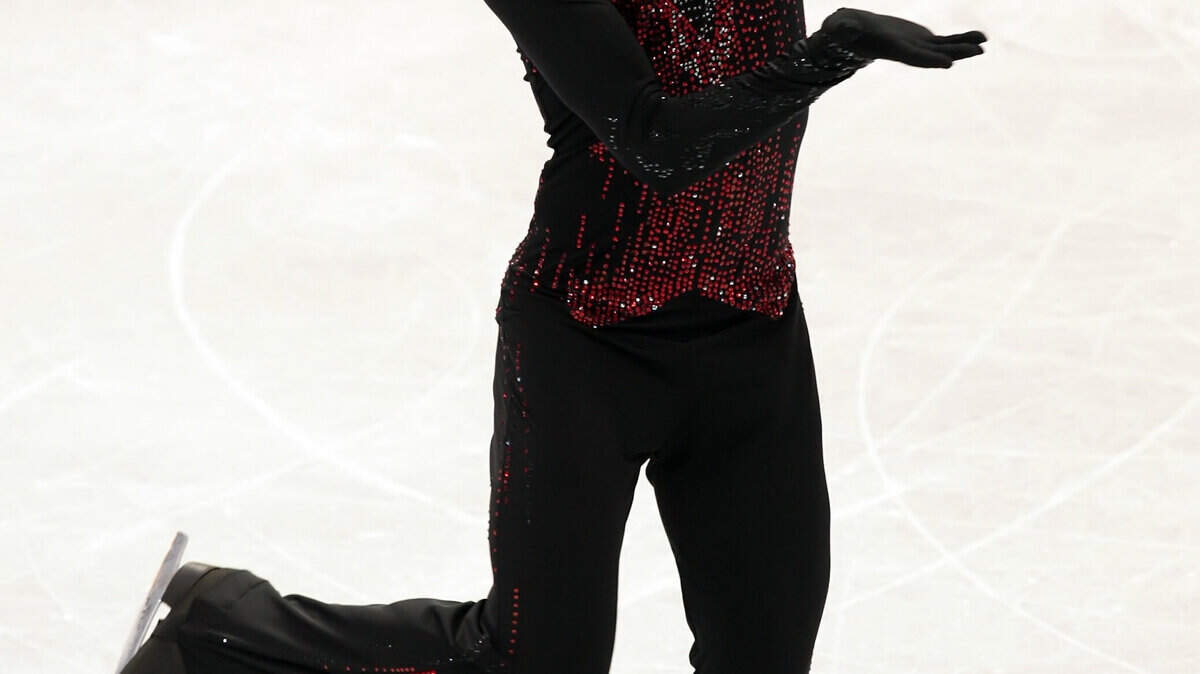 Evgeni Plushenko of Russia competes in the men's free skate. (George Bridges / MCT)