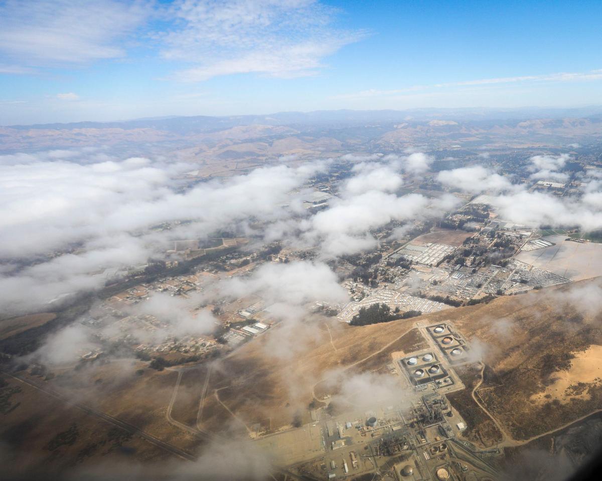 Fog breaks up over the Santa Maria Refinery on the Nipomo Mesa near the Oceano Dunes.