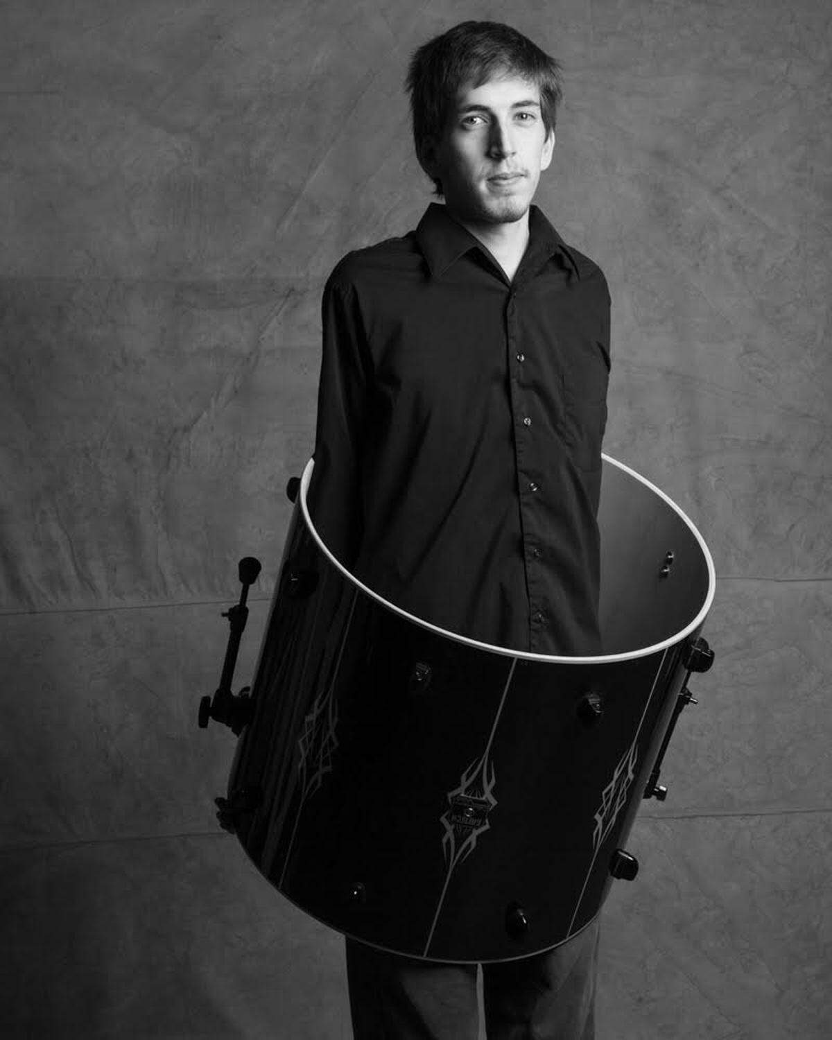 From “The Cambria Portraits,” photographer Joe Dominguez likes this photo of Alex Hansen “for its symbolic representation of his life at the time, being consumed with drumming.”