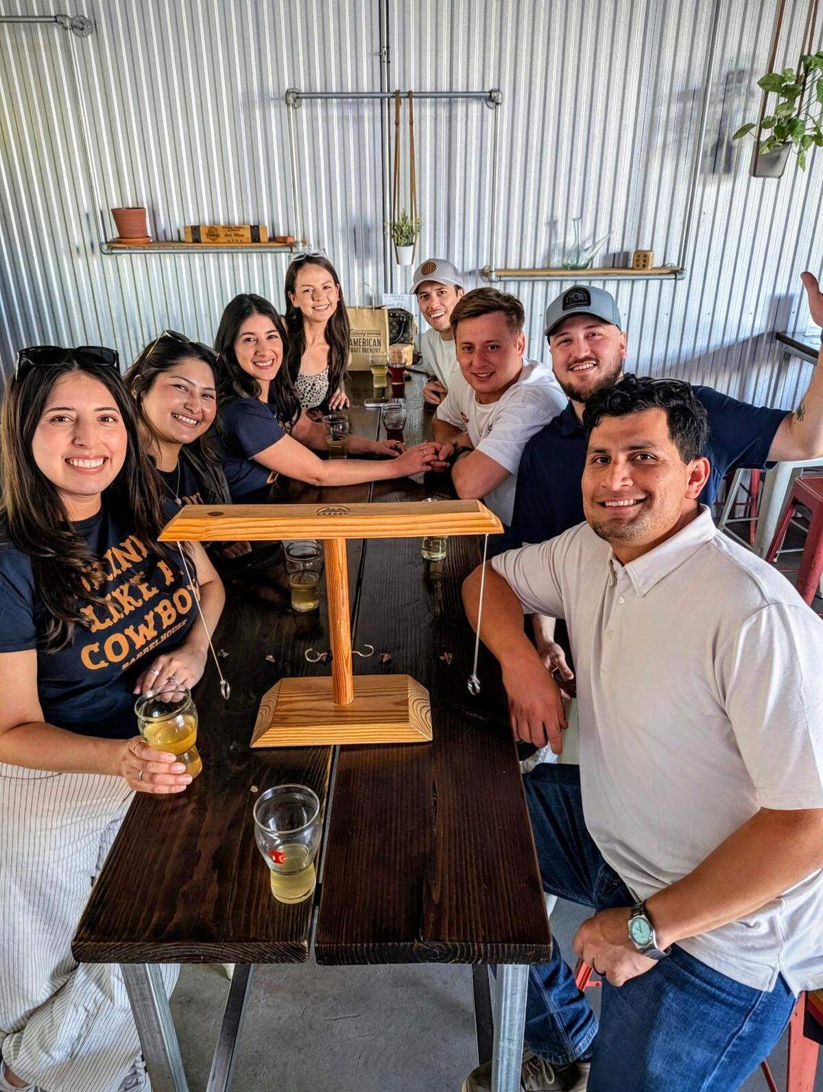 Guests gather at Tin City Cider Co. in Paso Robles on May 23, 2026. The tap house has long served as a gathering place within the Tin City district for locals, tourists and Cal Poly students.