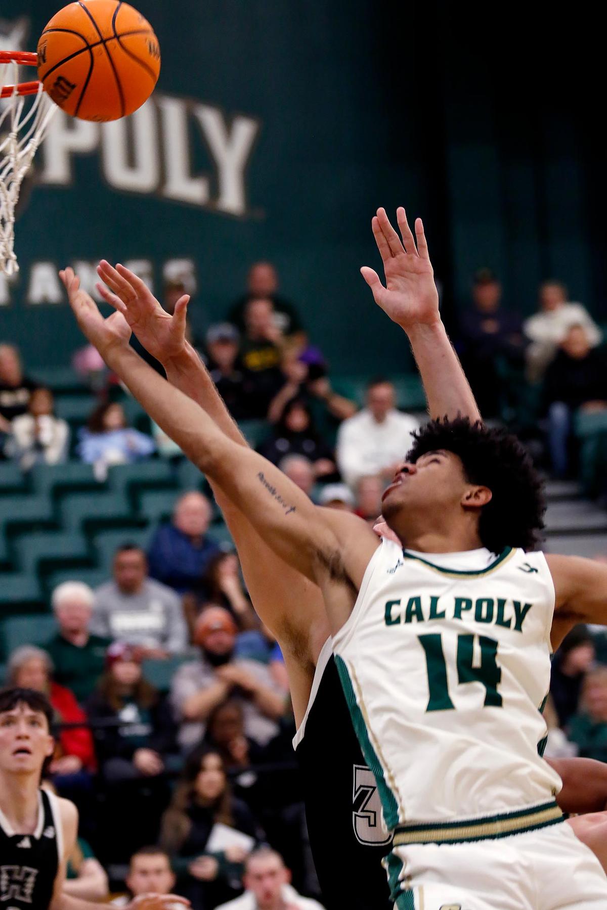 Cayden Ward attempts a basket. Cal Poly beat Hawaii 79-63 in a men’s basketball game at Mott Athletic Center in San Luis Obispo on Thursday, Feb. 6, 2025.