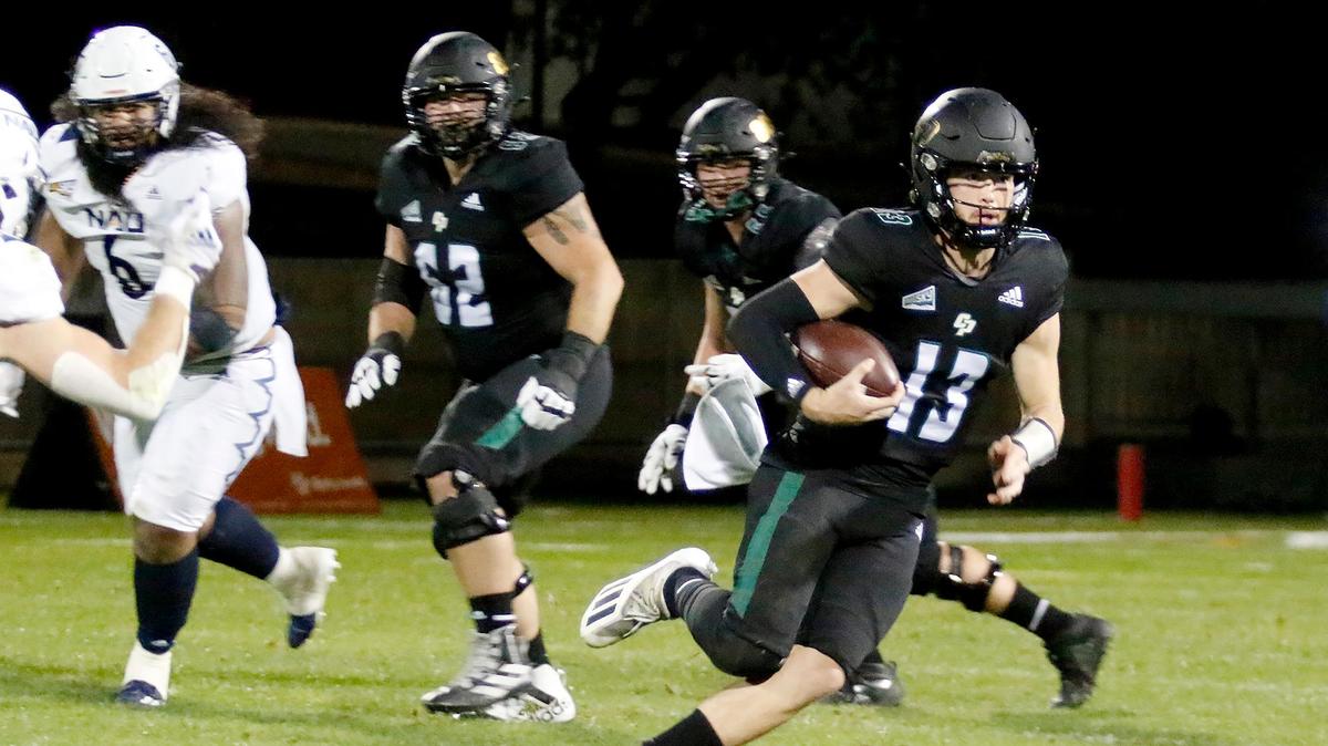 Cal Poly quarterback Spencer Brash (13) runs with the ball. In its season finale, Cal Poly fell to Northern Arizona 45-21 at Alex G. Spanos Stadium in San Luis Obispo, on Saturday, Nov. 20, 2021.