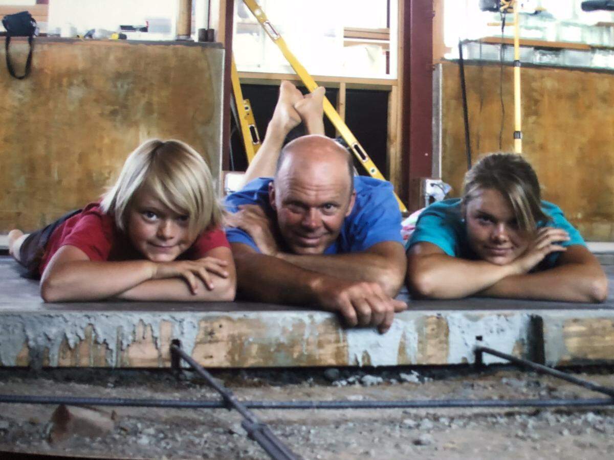 San Luis Obispo County homeowners Cam and Janeen Schiff and their two children Jairn (left) and Cleo (right) spent 15 years turning a 40-acre mountaintop property between Cayucos and Atascadero into an ecologically-friendly home. Built primarily from reused materials, the property features several environmentally-friendly features including San Luis Obispo County’s only legal composting toilet, rainwater reclamation system and a solar-powered hot tub.