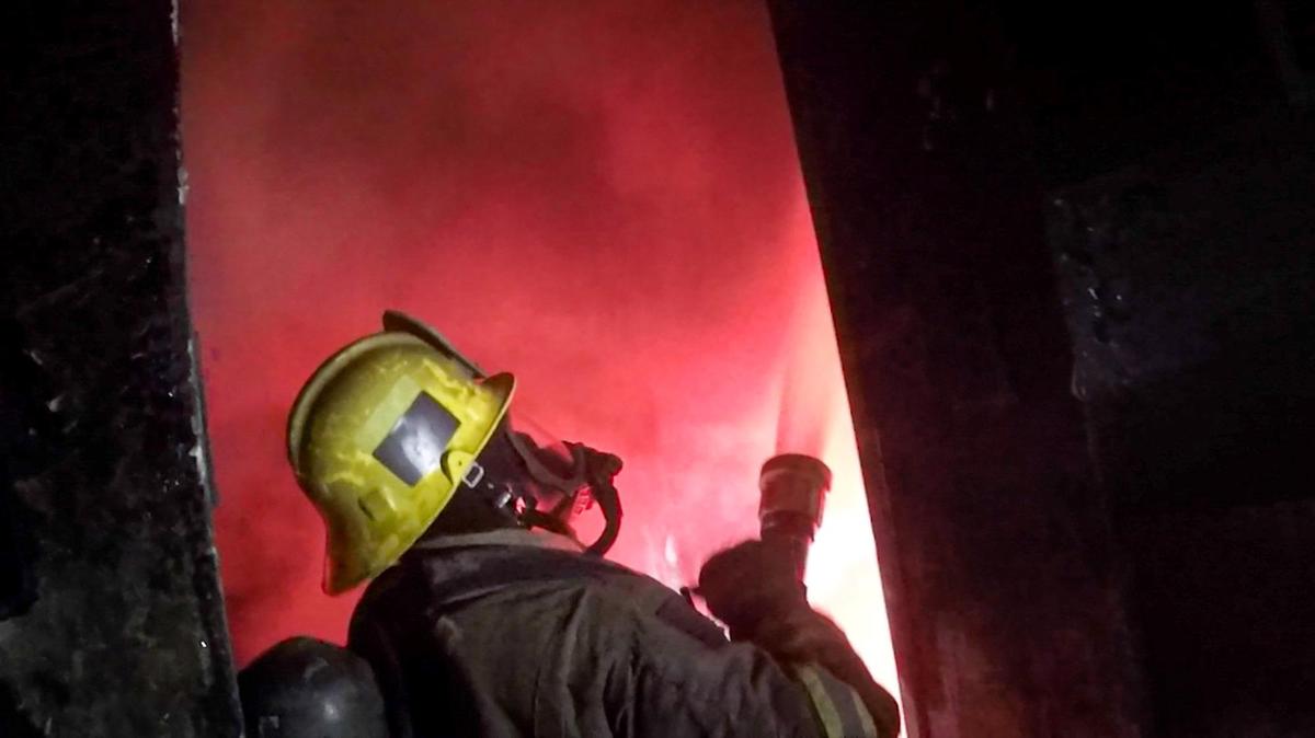 Paso Robles firefighters trained putting out fires during a controlled burn exercise inside a house March 21, 2022 as seen in this frame capture from video.