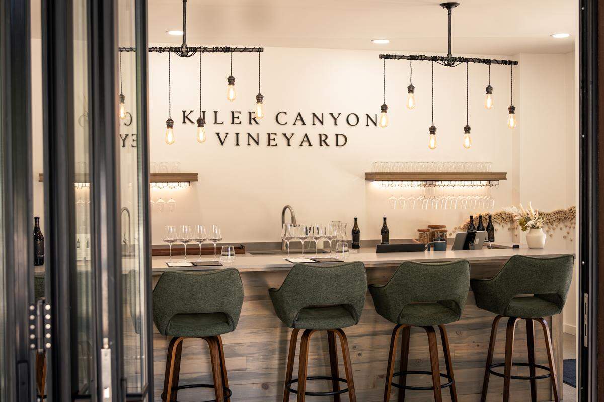 The walk-up bar inside Kiler Canyon Vineyard’s new tasting room offers pre-poured flights of its micro-lot wines.