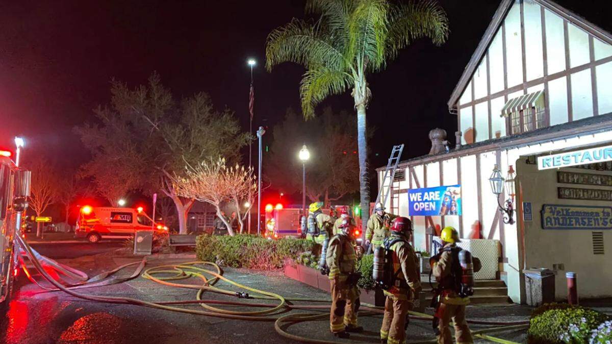 Firefighters respond to a roof fire at the Pea Soup Andersen’s Restaurant in Buellton on Sunday, Feb. 26, 2023.
